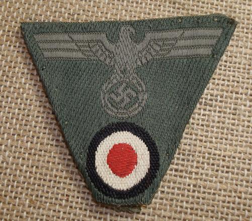 WWII GERMAN EM/NCO\'S M43 TRAPEZOID CAP INSIGNIA